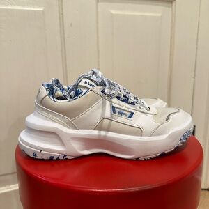 Lacoste Ace Lift leather chunky marble sneakers in white and blue